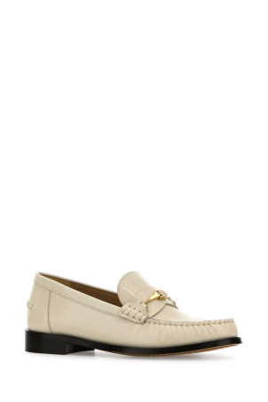 Шкіряні мокасини Harry кольору слонової кістки SALVATORE FERRAGAMO (01J6567810111C) Шкіряні мокасини Harry кольору слонової кістки SALVATORE FERRAGAMO (01J6567810111C)