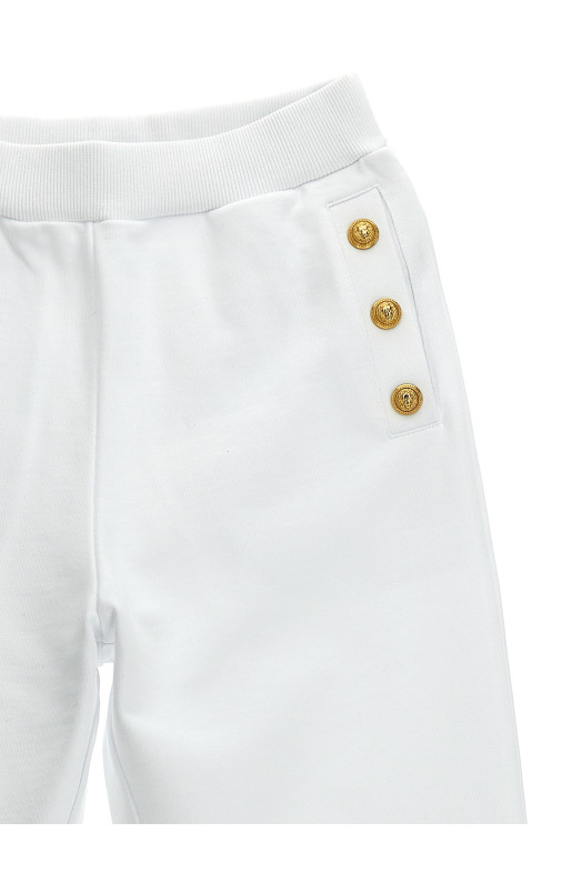 Джоггеры з логотипом на ґудзиках Білий BALMAIN KIDS BU6A60Z0081100OR Джоггеры з логотипом на ґудзиках Білий BALMAIN KIDS BU6A60Z0081100OR