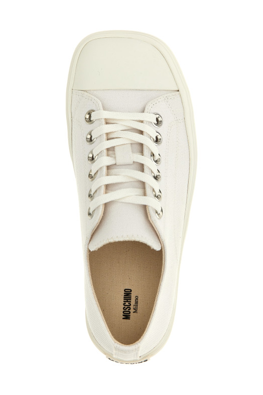 Полотняні кросівки білі MOSCHINO MA15053G1MMW010A Полотняні кросівки білі MOSCHINO MA15053G1MMW010A