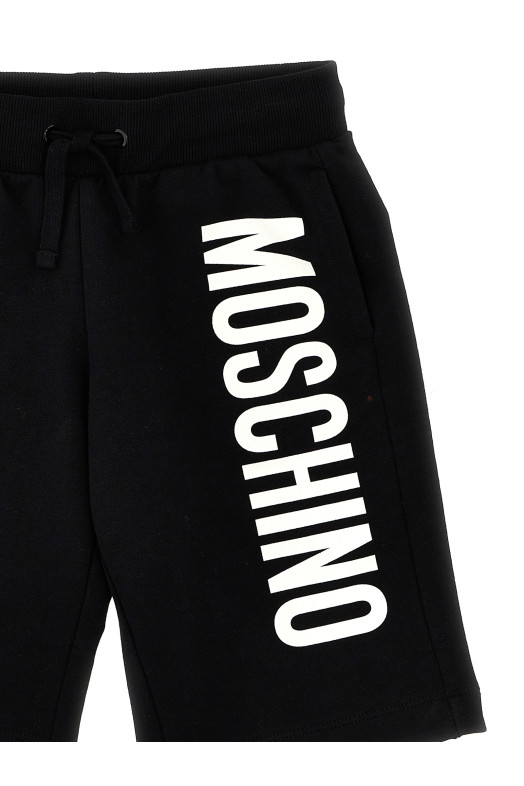Бермуди з логотипом чорно-сірі з принтом MOSCHINO KID TEEN HUQ02FLDA25NEROBLACK Бермуди з логотипом чорно-сірі з принтом MOSCHINO KID TEEN HUQ02FLDA25NEROBLACK