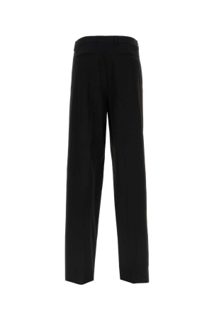 Брюки из черной вискозной смеси VERSACE (10082911A05965) Брюки из черной вискозной смеси VERSACE (10082911A05965)