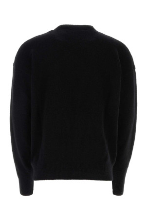 Black stretch wool blend sweater PALM ANGELS (PMHE054F23KNI005)