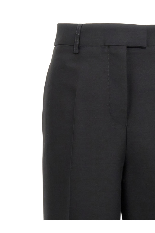 Stretched pleated trousers Black Stretched pleated trousers Black