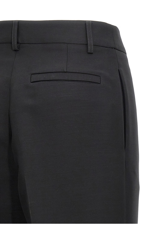 Stretched pleated trousers Black Stretched pleated trousers Black