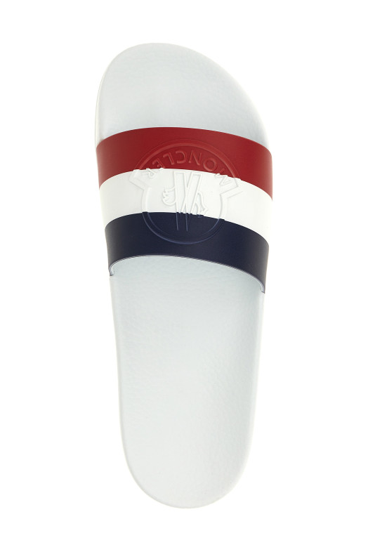 Слайди MONCLER  Слайди MONCLER