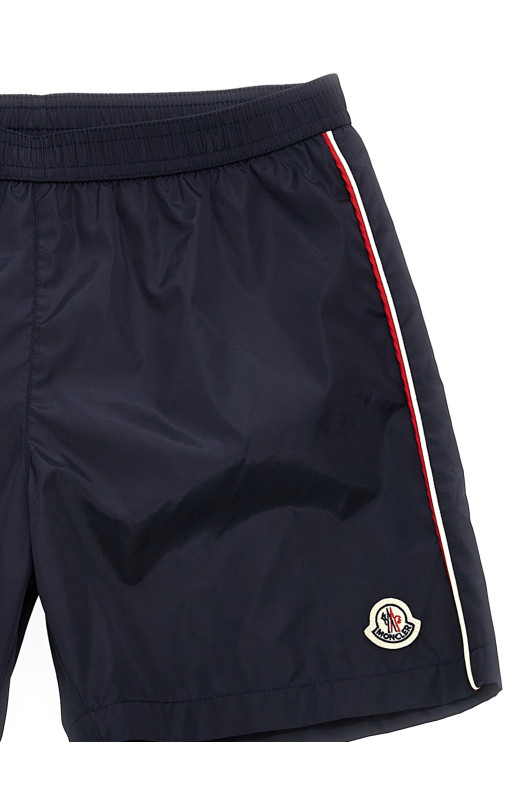 Шорти для плавання з нашивкою з логотипом Синій MONCLER ENFANT K19542C0000953326742 Шорти для плавання з нашивкою з логотипом Синій MONCLER ENFANT K19542C0000953326742