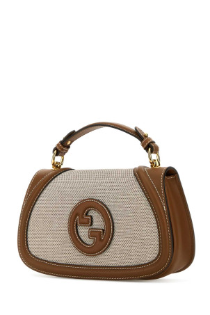 Двухцветная сумка Gucci Blondie из канваса и кожи (815714HAAKF) Двухцветная сумка Gucci Blondie из канваса и кожи (815714HAAKF)