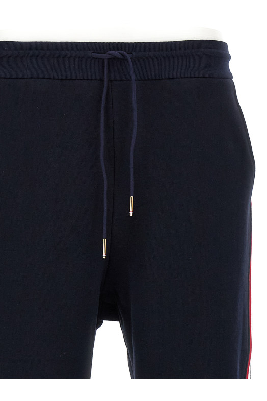 Джоггеры THOM BROWNE 'Classic Loopback Stripe' Синий MJQ066A03377415 Джоггеры THOM BROWNE 'Classic Loopback Stripe' Синий MJQ066A03377415