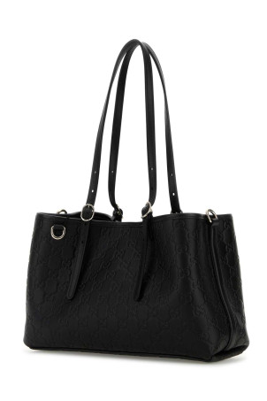 Чорна шкіряна сумка через плече з емблемою GG Чорна GUCCI (815214AAFDV) Чорна шкіряна сумка через плече з емблемою GG Чорна GUCCI (815214AAFDV)