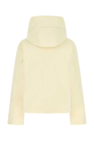 Кремовая полиэстеровая укороченная пуховая куртка JIL SANDER (J40AF0009J70008) Кремовая полиэстеровая укороченная пуховая куртка JIL SANDER (J40AF0009J70008)