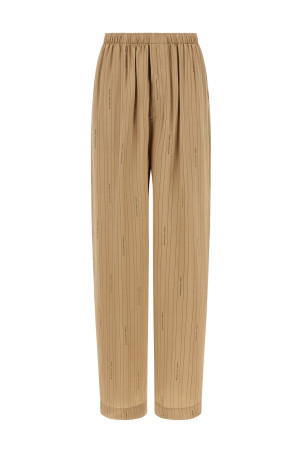 Штани «Coocon» Бежеві 847154TSLA62684