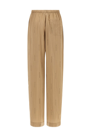 Штани «Coocon» Бежеві 847154TSLA62684