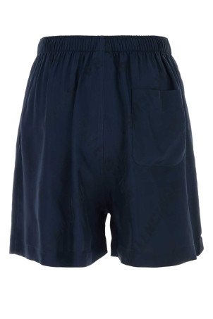 Бермуды из атласа темно-синего цвета BALENCIAGA (746223TOO13) Бермуды из атласа темно-синего цвета BALENCIAGA (746223TOO13)