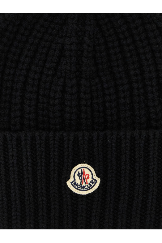 Вовняна шапка з кашеміром, чорна MONCLER K20933B00035M4281999 Вовняна шапка з кашеміром, чорна MONCLER K20933B00035M4281999