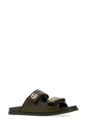 Оливковые кожаные тапочки GUCCI (816633AAEKU) Оливковые кожаные тапочки GUCCI (816633AAEKU)