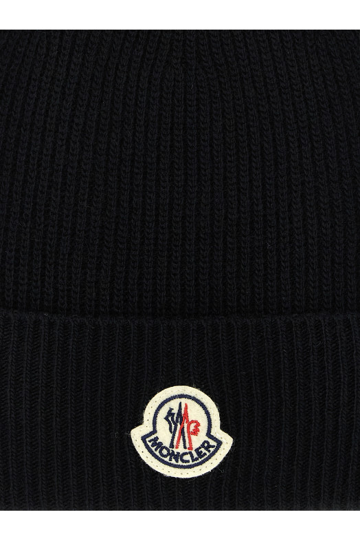 Шерстяная и кашемировая шапка Черная MONCLER K20913B00074M1900999 Шерстяная и кашемировая шапка Черная MONCLER K20913B00074M1900999