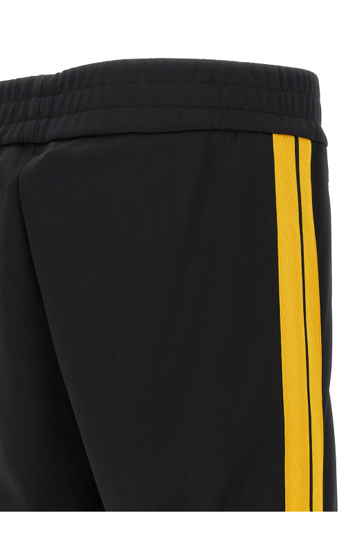 Спортивні штани «Classico Logo Track» чорного кольору PMCJ020F25FAB00110181018 Спортивні штани «Classico Logo Track» чорного кольору PMCJ020F25FAB00110181018