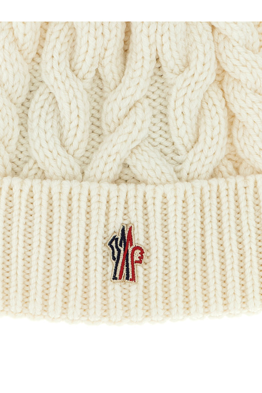 Плетена вовняна шапка Біла MONCLER GRENOBLE K20983B00013M1172034 Плетена вовняна шапка Біла MONCLER GRENOBLE K20983B00013M1172034