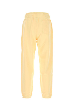 Pastel yellow cotton joggers NEW BALANCE (MP43547CAU) Pastel yellow cotton joggers NEW BALANCE (MP43547CAU)