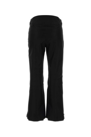 Черные лыжные брюки из полиэстера Черные MONCLER GRENOBLE (K20982G00008597MO) Черные лыжные брюки из полиэстера Черные MONCLER GRENOBLE (K20982G00008597MO)