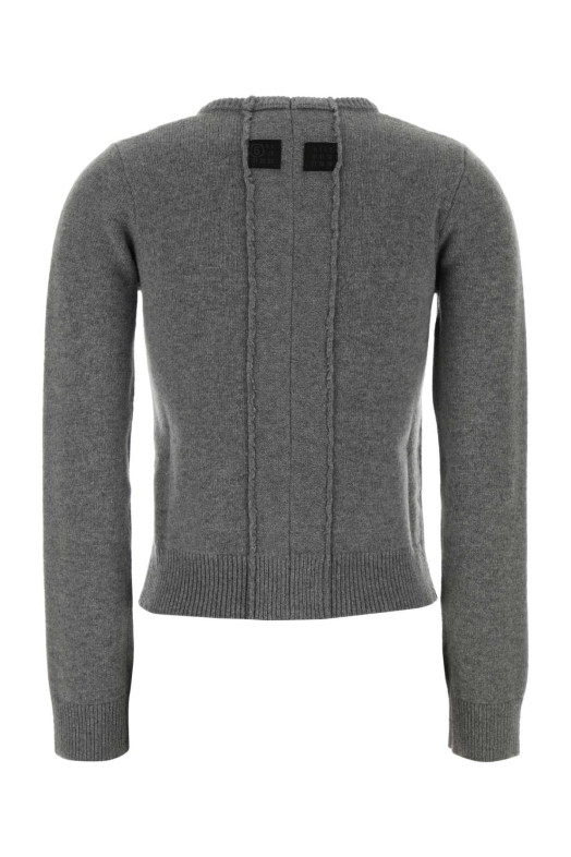 Серый кардиган из шерстяной смеси MM6 MAISON MARGIELA (S62HP0036M13187) Серый кардиган из шерстяной смеси MM6 MAISON MARGIELA (S62HP0036M13187)