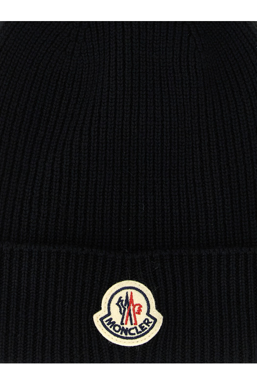 Шерстяная шапка Черная MONCLER K20913B70500A9342999 Шерстяная шапка Черная MONCLER K20913B70500A9342999