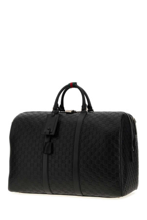 Black leather GG Emblem duffle bag GUCCI (850216AAFOM)