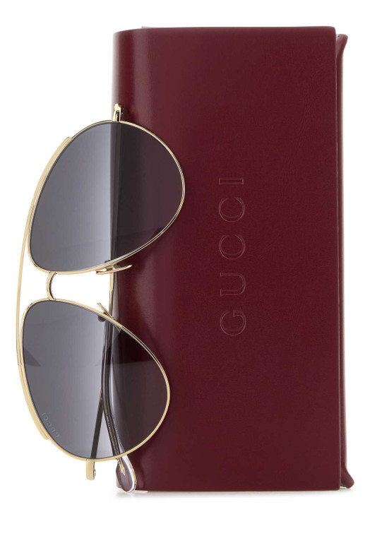 Золотые металлические солнцезащитные очки GUCCI (851180I3330)