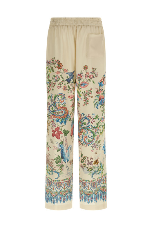 Flora and fauna printed trousers Beige