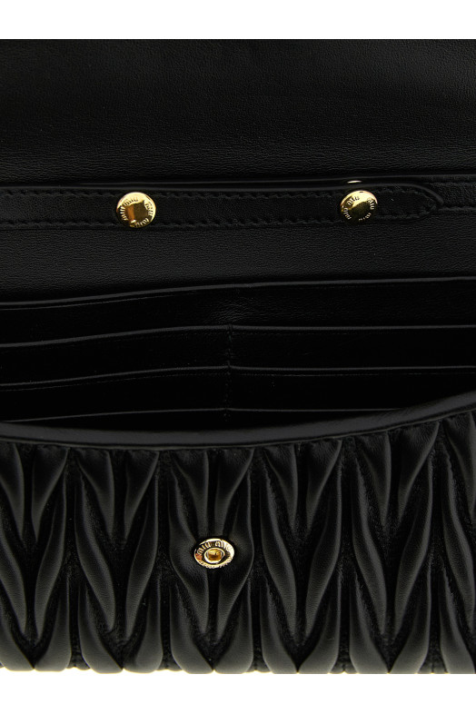 Кошелек на цепочке из стеганой кожи наппа, черный MIU MIU 5MT025AFPPF0002