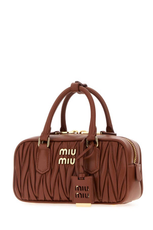 Brick leather Arcadie handbag MIU MIU (5BB142VOONAN88)
