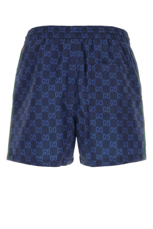 Printed polyester swimming shorts GUCCI (815602XHAJ3)