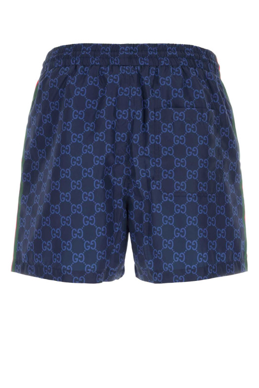 Printed polyester swimming shorts GUCCI (815602XHAJ3)