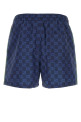 Printed polyester swimming shorts GUCCI (815602XHAJ3)