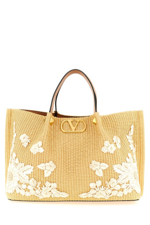 Shopping Valentino Garavani medium raffia Beige