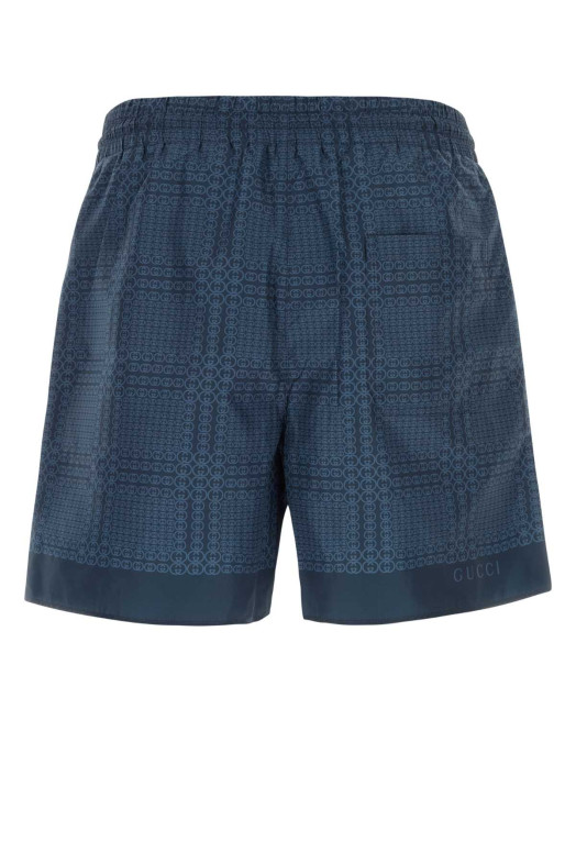 Printed polyester swimming shorts GUCCI (856212XHALB)