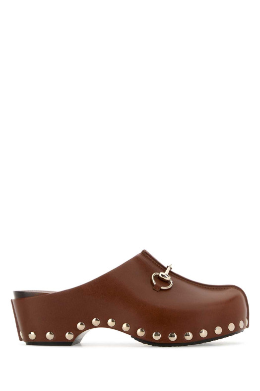 Brown leather clogs GUCCI (854409AAF9G)