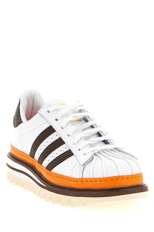 'Clot EX Orange Superstar' sneakers by Edison Chen Brown