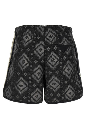 'Clot' bermuda shorts by Edison Chen Gray