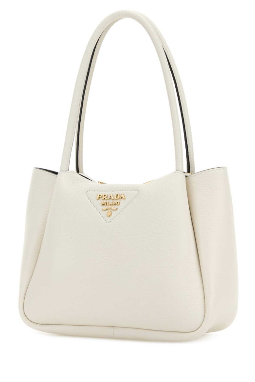 Небольшая сумочка из кожи цвета слоновой кости PRADA (1BC145VSNM2DKV)