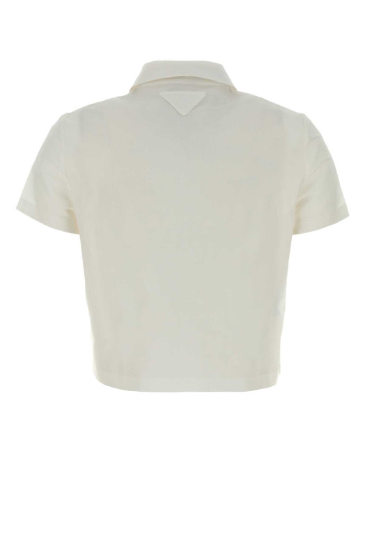 Белая хлопковая рубашка черного цвета от PRADA (P454JSOOO189C)