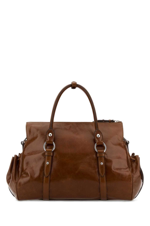 Кожаная сумочка MIU MIU коричневого цвета (5BA3282A44)