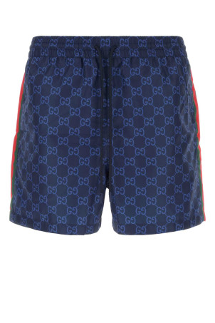 Printed polyester swimming shorts GUCCI (815602XHAJ3)