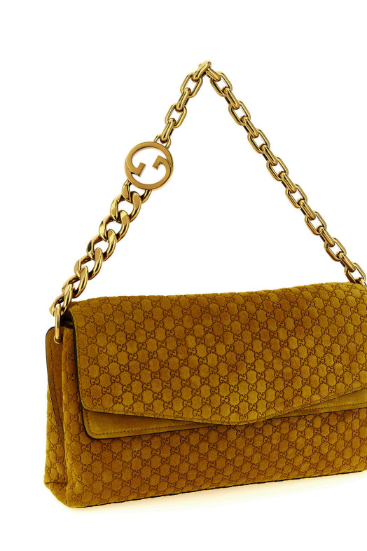 Средняя замшевая сумка через плечо GG, желтого цвета GUCCI 857622AAF0P7702