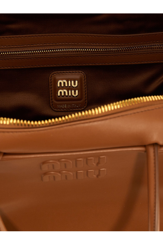 Сумка-кофр коричневого цвета MIU MIU 5BB117VMON2CRWF0046