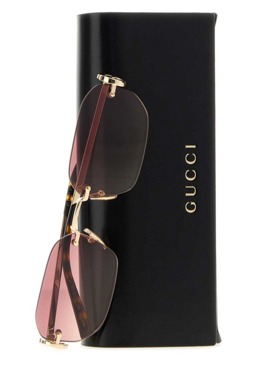Солнцезащитные очки из золота GUCCI (A000Q4I3330)