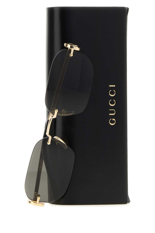 Солнцезащитные очки из золота GUCCI (A000Q4I3330)