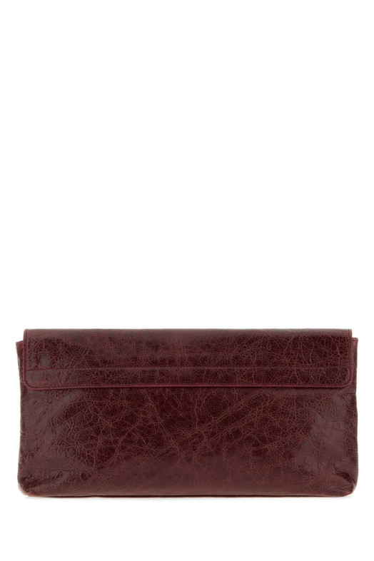 Кожаный клатч Le City от BALENCIAGA бордового цвета (8733862ABEK)