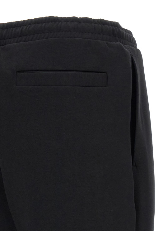 Хлопковые брюки черного цвета HUGO BOSS 50565748001