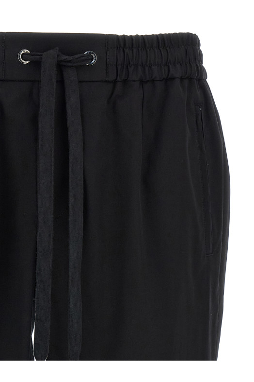 Logo plaque pants Black